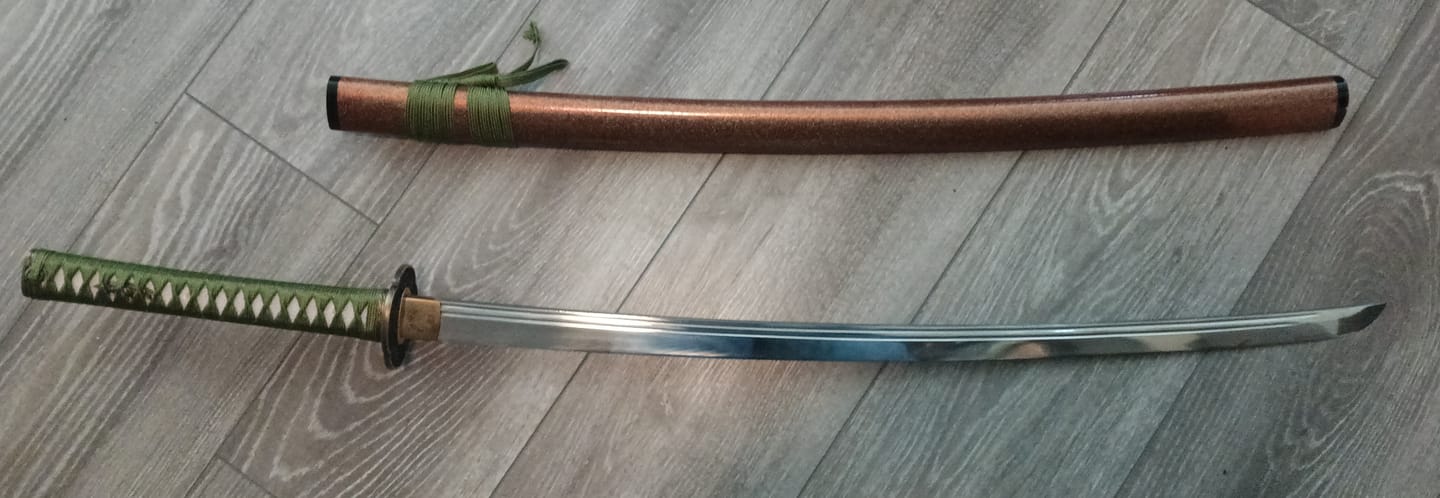 Customer photo review of The Fukyo Katana Spring Steel Double Bohi Razor Sharp