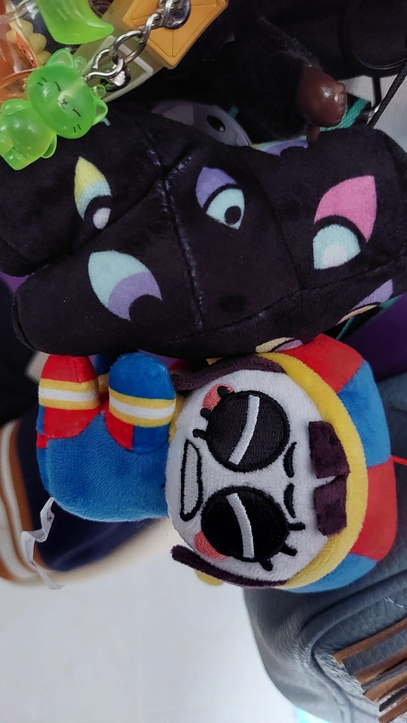 Customer photo review of Pomni & Abstraction Magnetic Plush Keychains