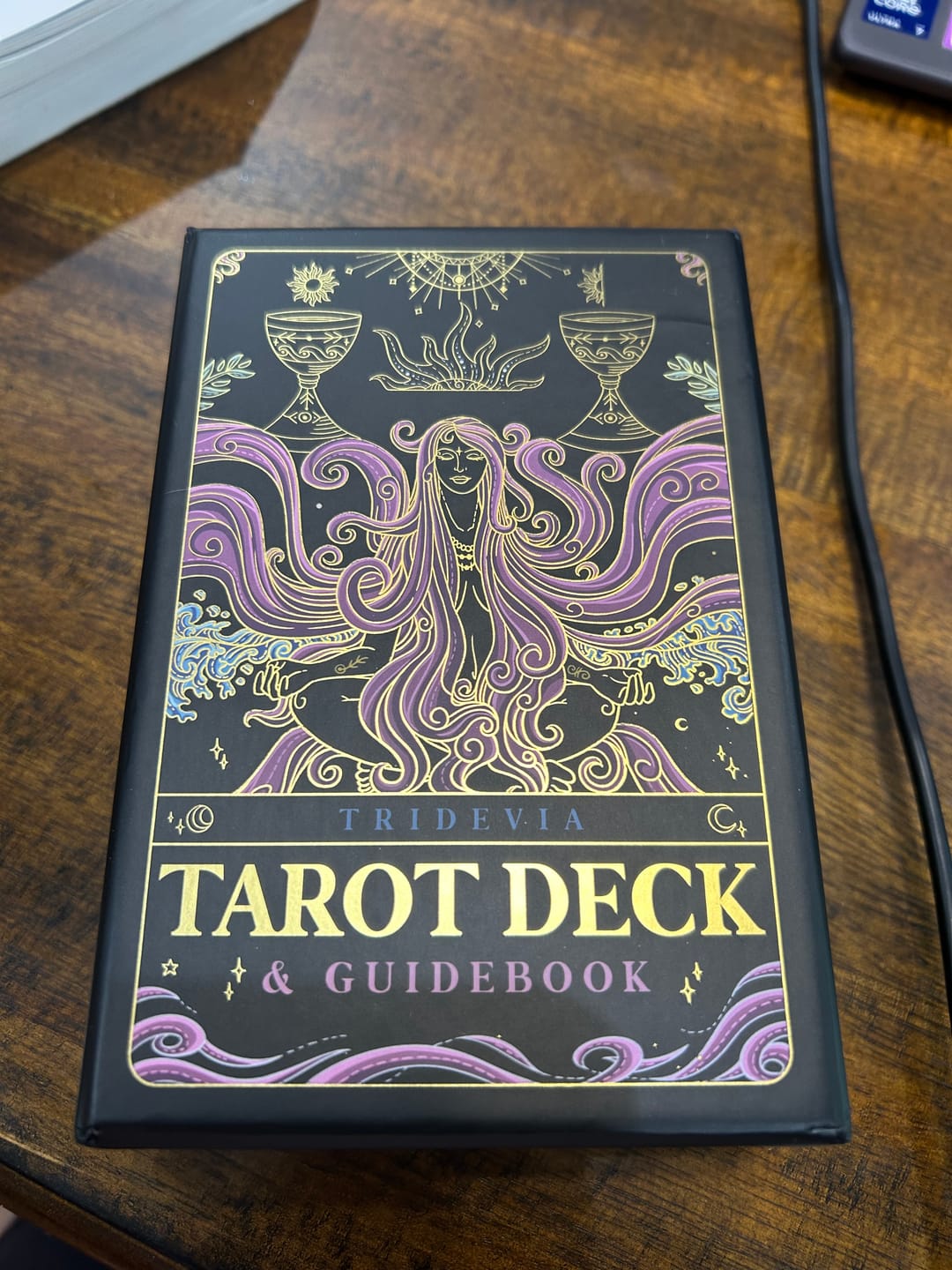 Customer photo review of Tridevia Golden Foil 78-Card Tarot Deck with Enlightening Affirmations in a Luxury Collector’s Box