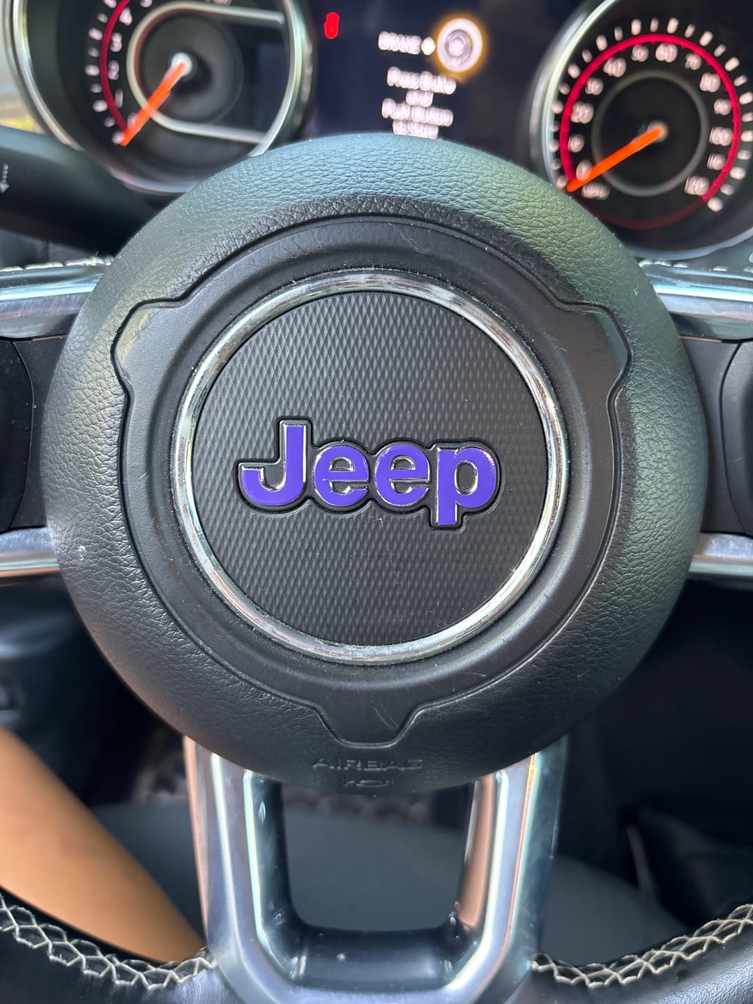 Customer photo review of JEEP Steering Wheel Emblem Overlay Decal — 30+ Colors & Designs (Flag, Topo, Animal, Solid)
