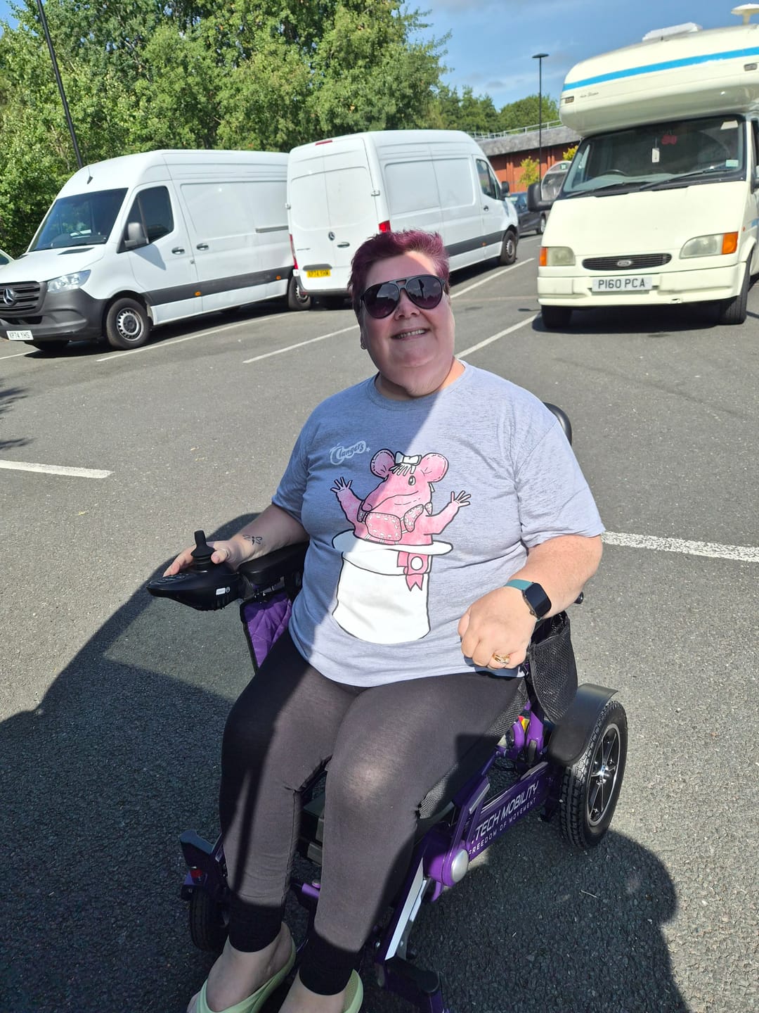 Customer photo review of Limited Edition Purple Lightweight Electric Wheelchair | Freedom Pro ST