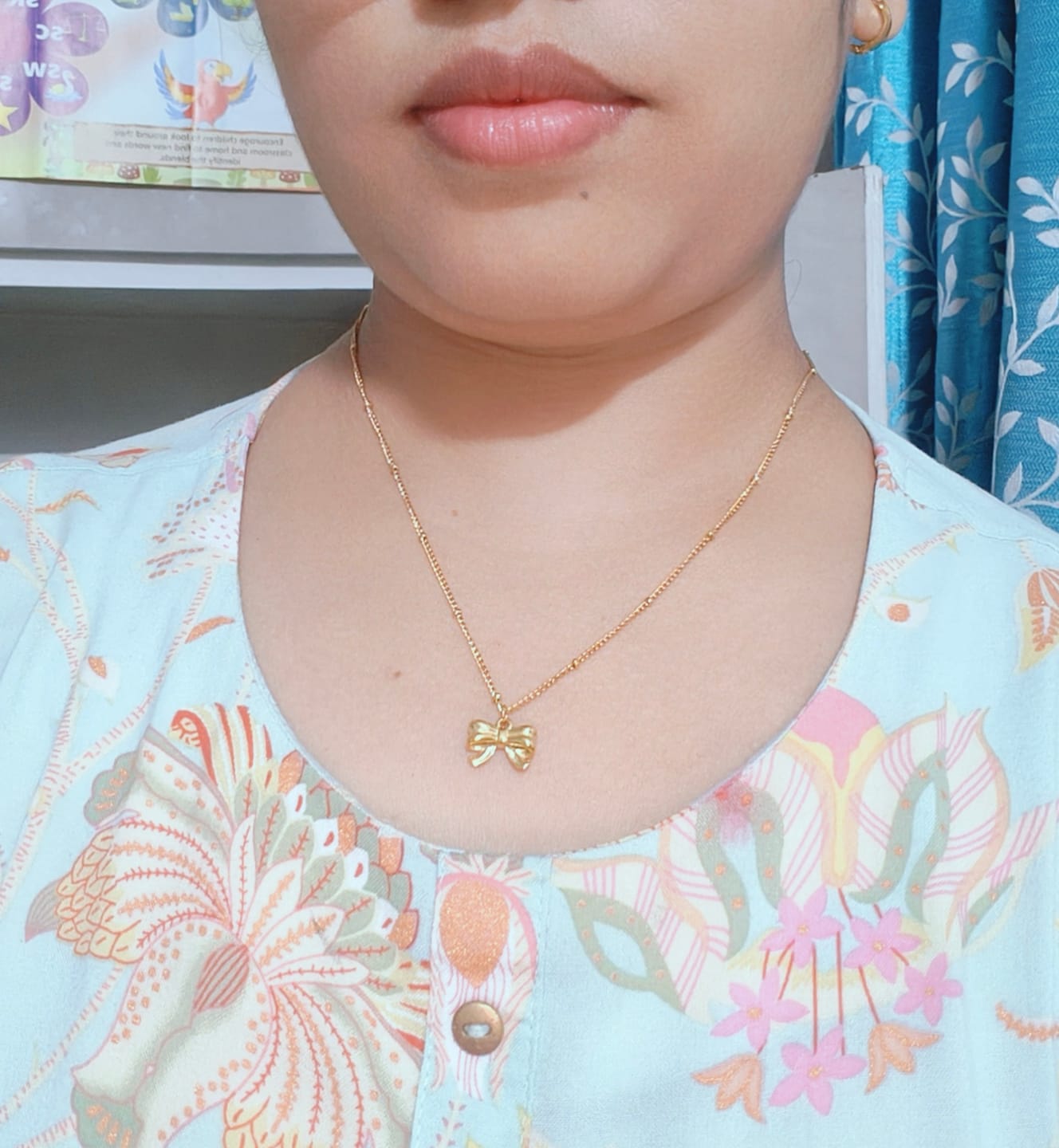 Customer photo review of Bow Pendant Necklace