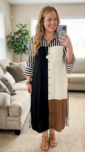 Customer's striped midi dress with black, cream, and brown panels, worn in a home setting.