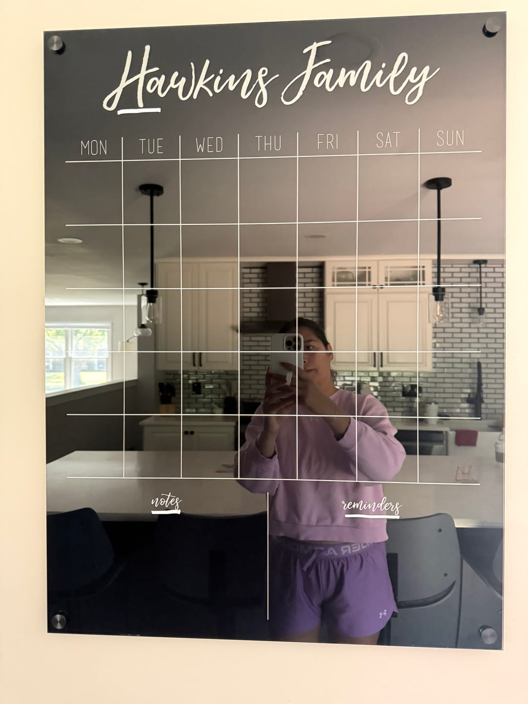 Customer photo review of Monthly Black Acrylic Calendar + 2 Sections | Vertical Traeger