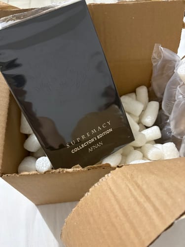 Customer's Afnan Supremacy Collector's Edition perfume box inside an open shipping carton with packing peanuts.