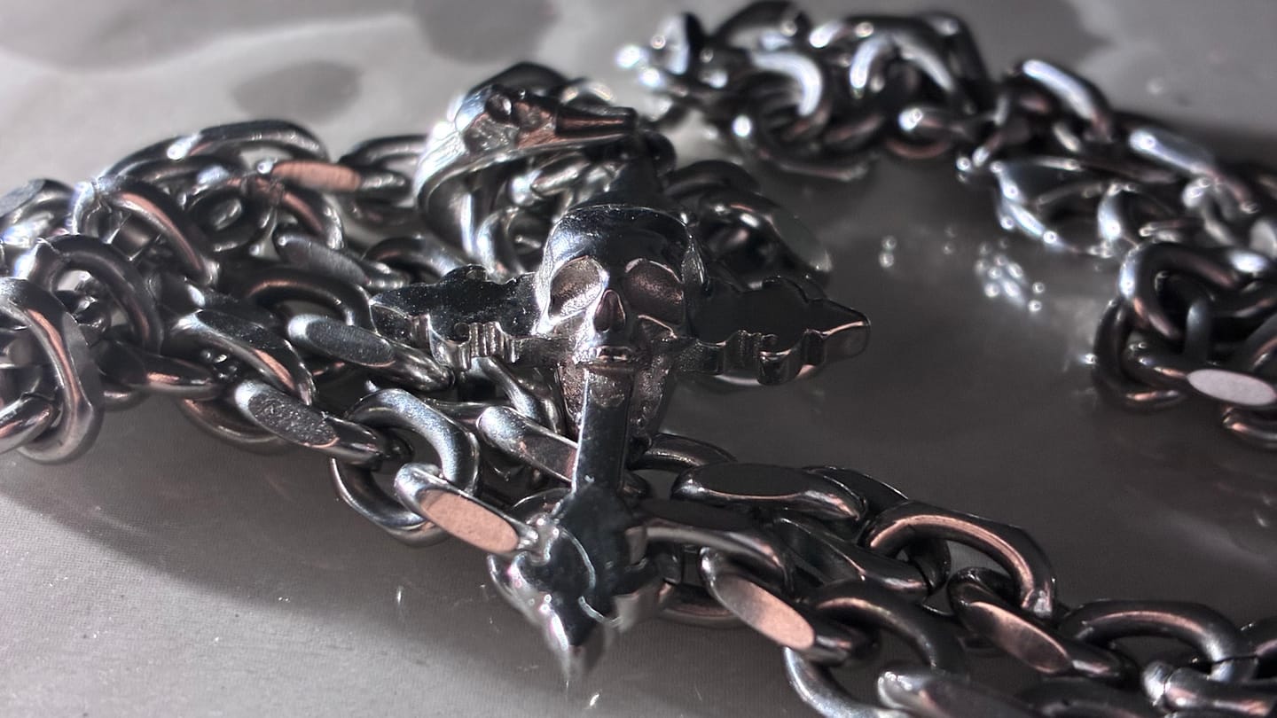 Customer photo review of DOWN YOUR THROAT PENDANT