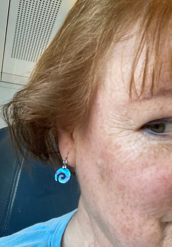 Customer photo review of NZ Paua Shell Maori Koru Earrings