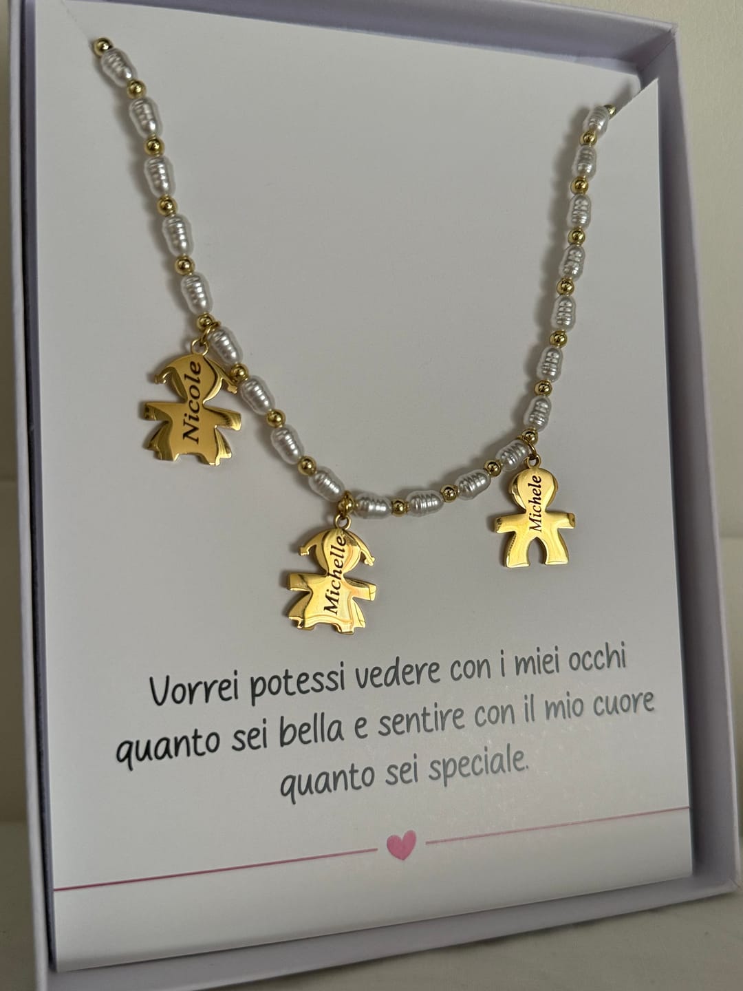 Customer photo review of Girocollo Family In Perle con ciondoli Bimbo Personalizzati