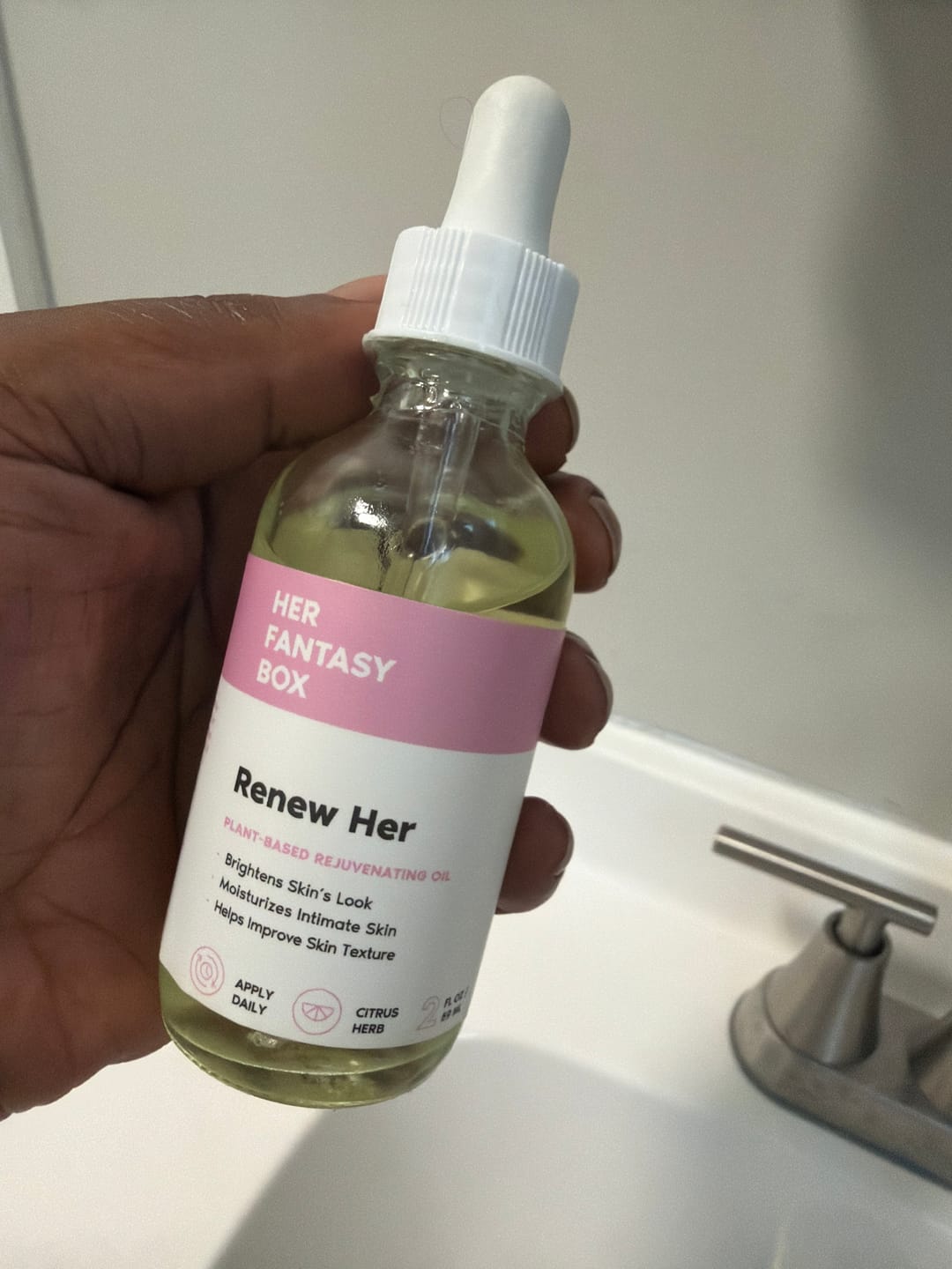 Customer photo review of Her Fantasy Box Renew Her Yoni Oil - For Dryness, Ingrown Hair, Dark Marks & Scars