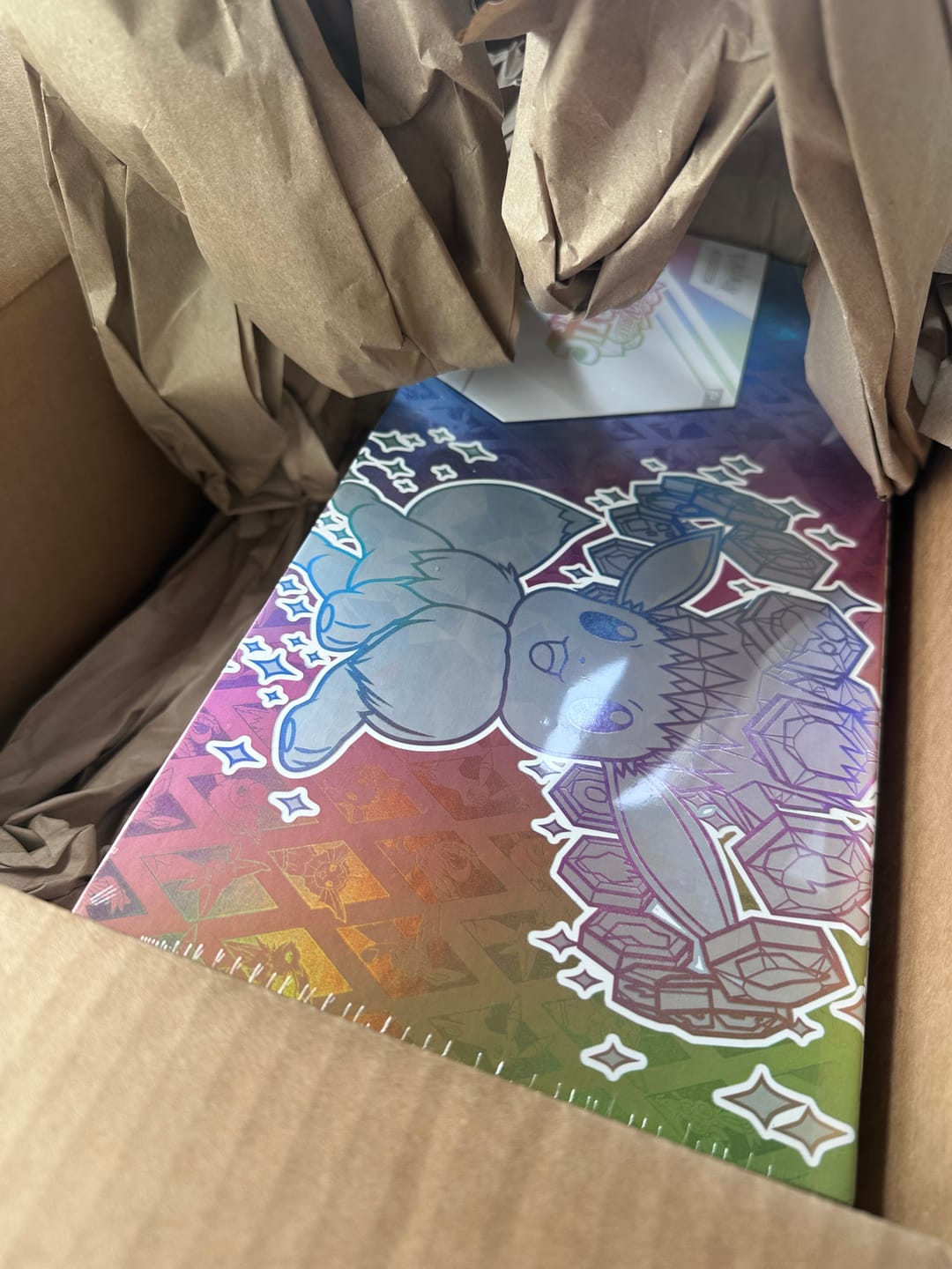 Customer photo review of Prismatic Evolutions Super-Premium Collection - SV: Prismatic Evolutions