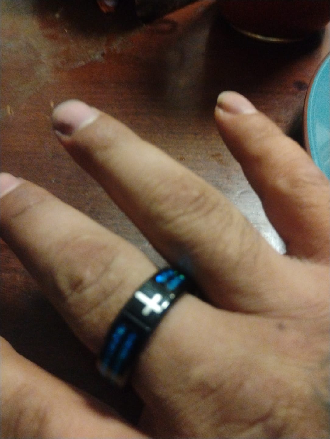 Customer photo review of FREE Today: Modern Titanium Steel Cross Ring with Laser Blue Inlay: Serenity in Christ's Blue Light