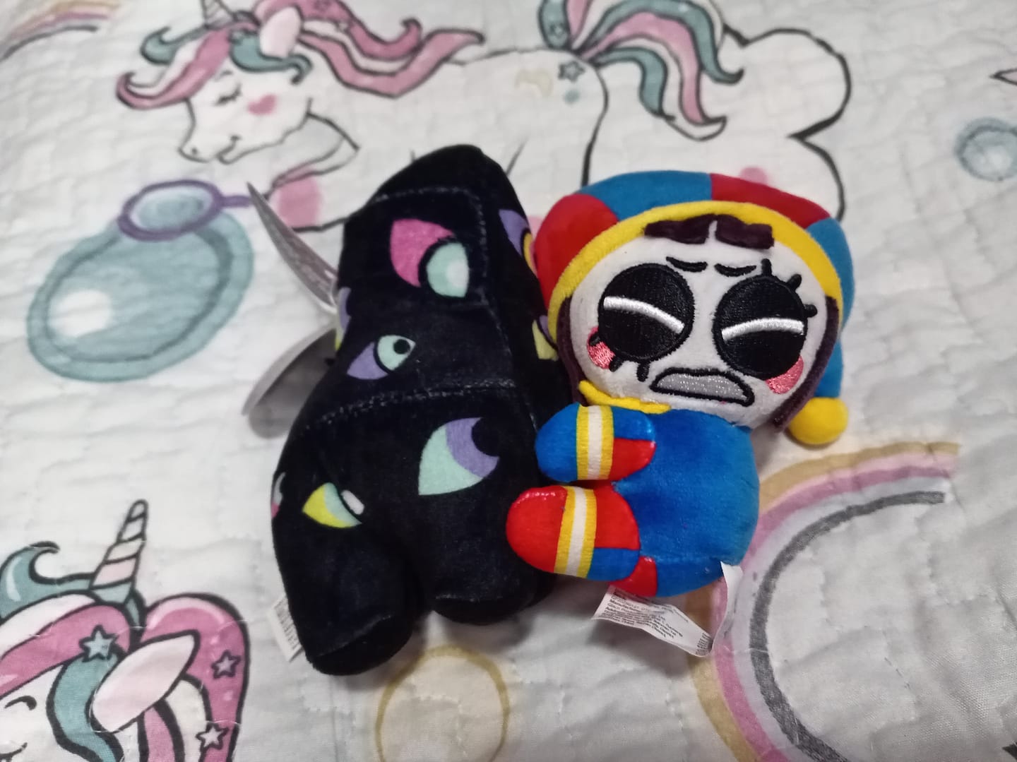 Customer photo review of Pomni & Abstraction Magnetic Plush Keychains