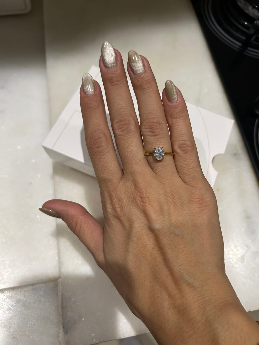 Customer photo review of Anel Solitário Lumière Banhado em Ouro 18k