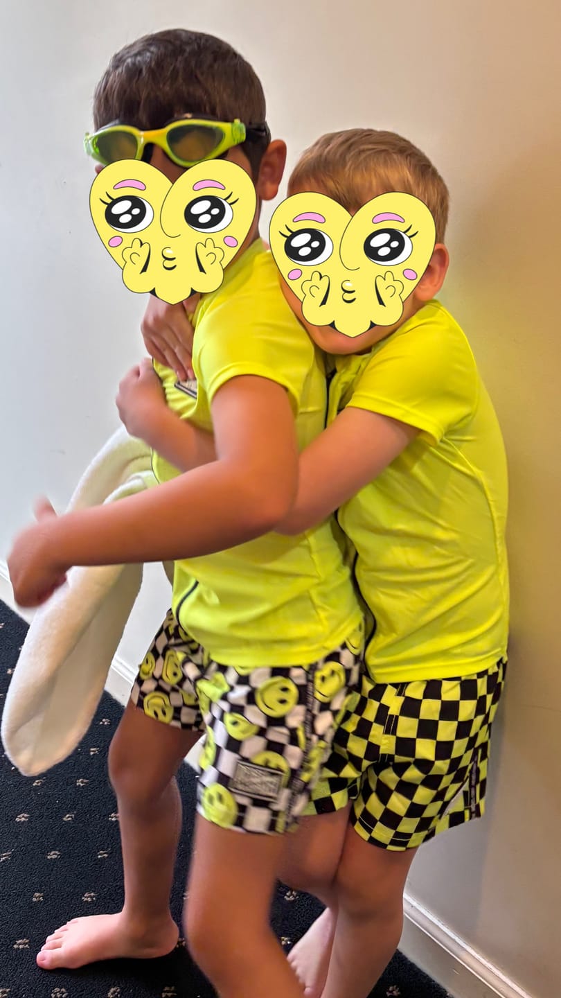 Customer photo review of Hybrid Swim Trunks in Neon Electric Lime Smileys