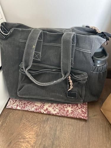 Reseña con foto de un cliente sobre Bolso Notebook Canvas Lavado