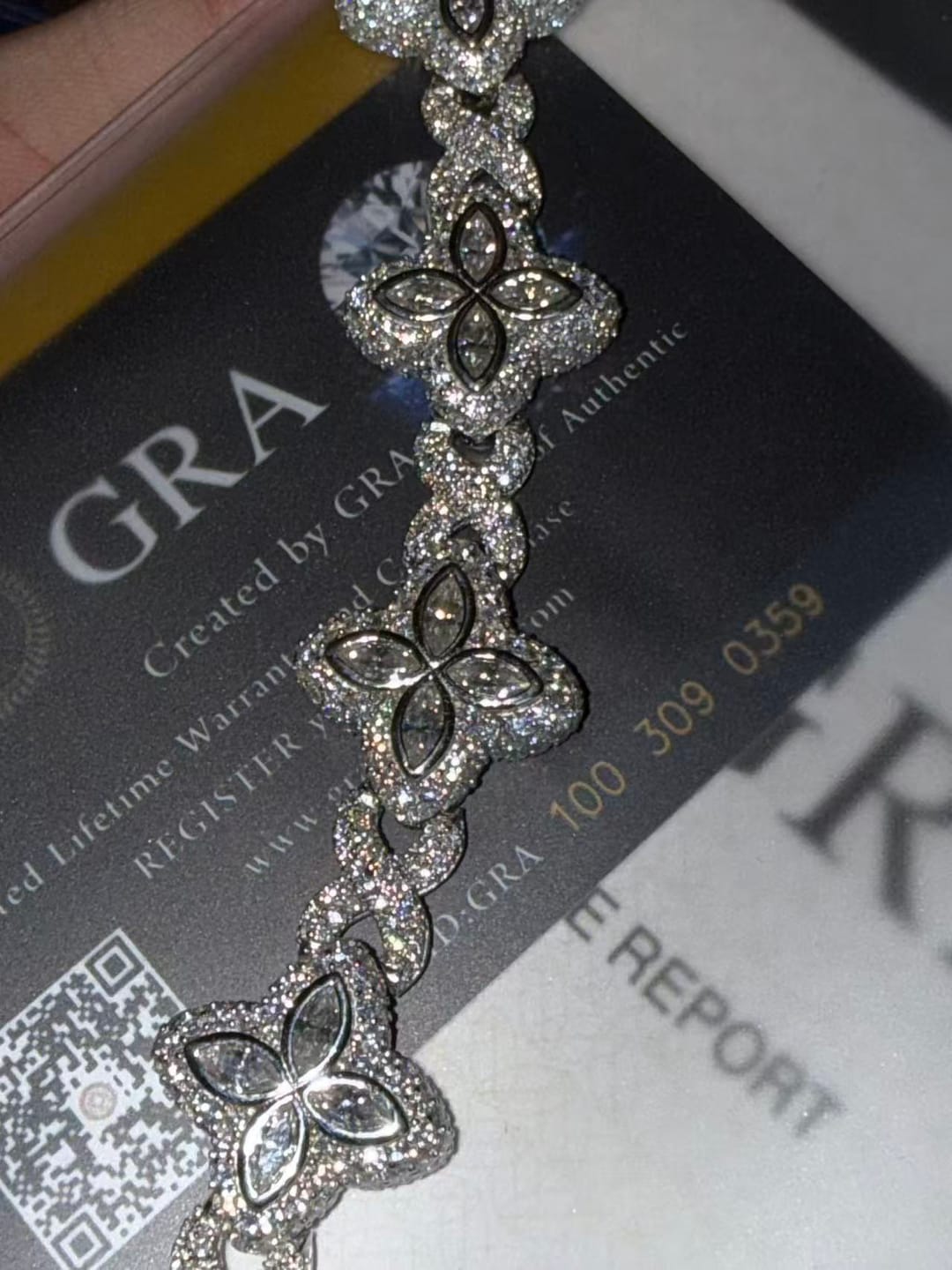 Customer photo review of 15MM 19MM S925 Silver Colored VVS Moissanite 4-Leaf Clover Infinity Link Bracelet