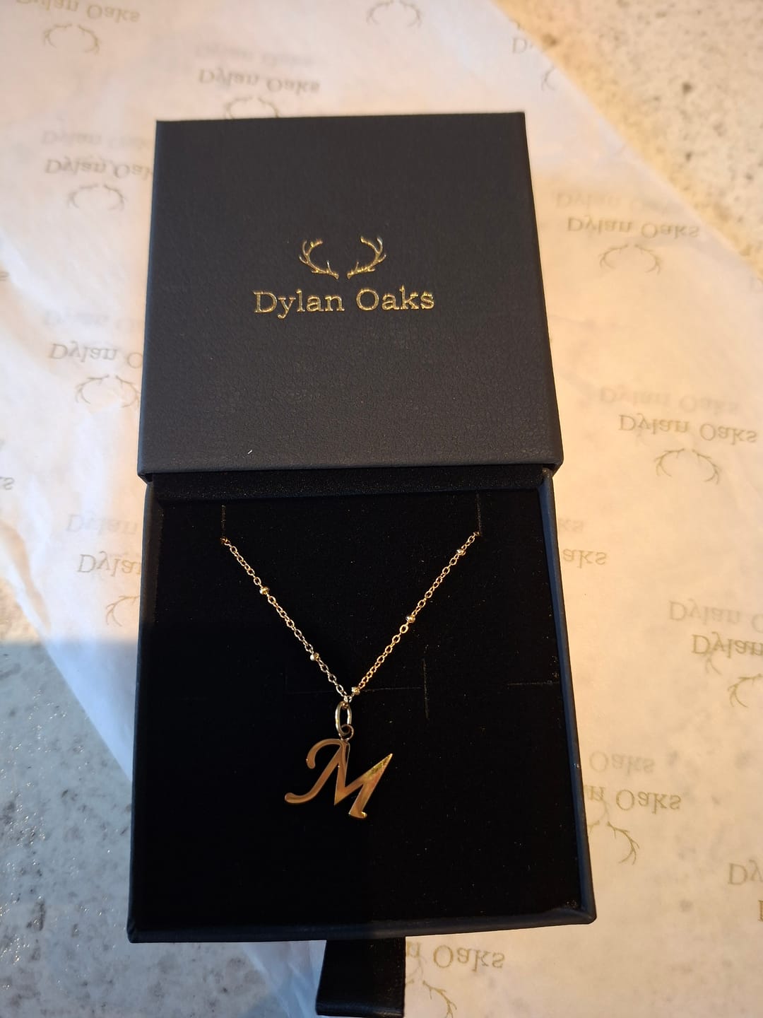 Customer photo review of M Script Initial Necklace Gold