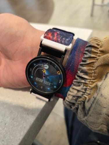 Customer wearing the colorful Milky Way Watch Band on their Star Trek themed watch.