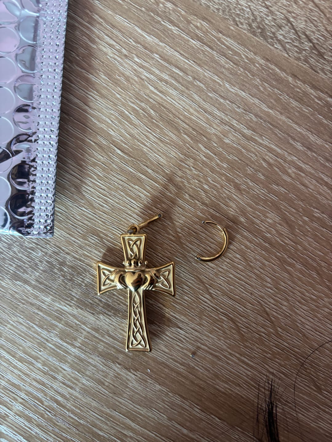 Customer photo review of Cross Claddagh Earrings