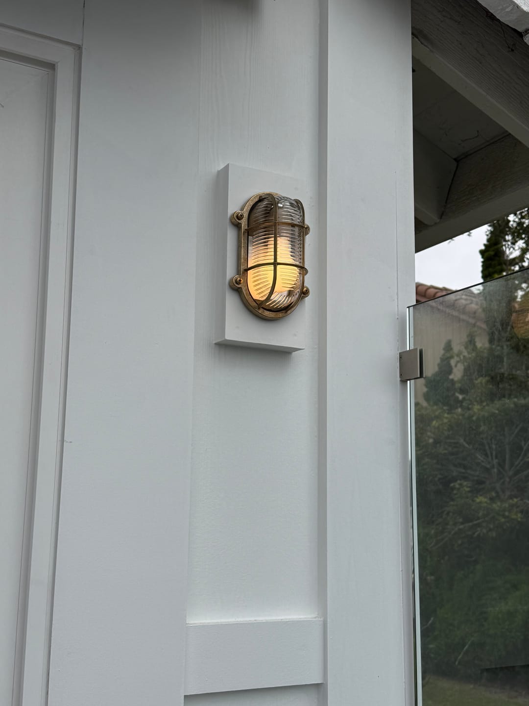 Customer photo review of LIPNO IP44 Brass Nautical Wall Sconce