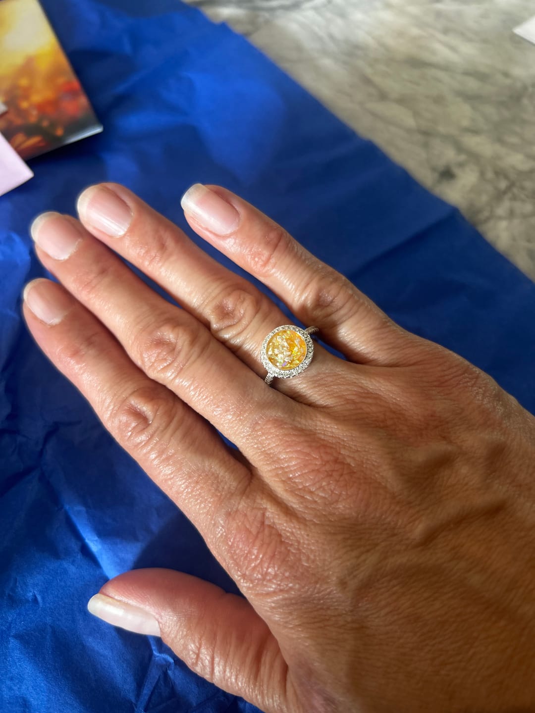 Customer photo review of Bedazzled Circle Opal Cremation Ring