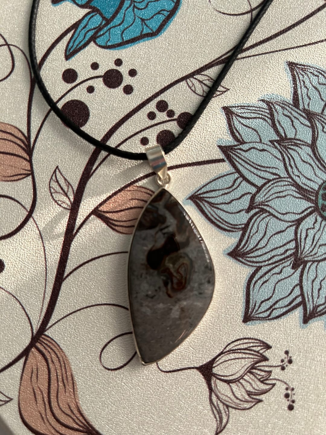 Customer photo review of Premium Rock Calcy Pendant 2 3/8" (.925 Sterling Silver)