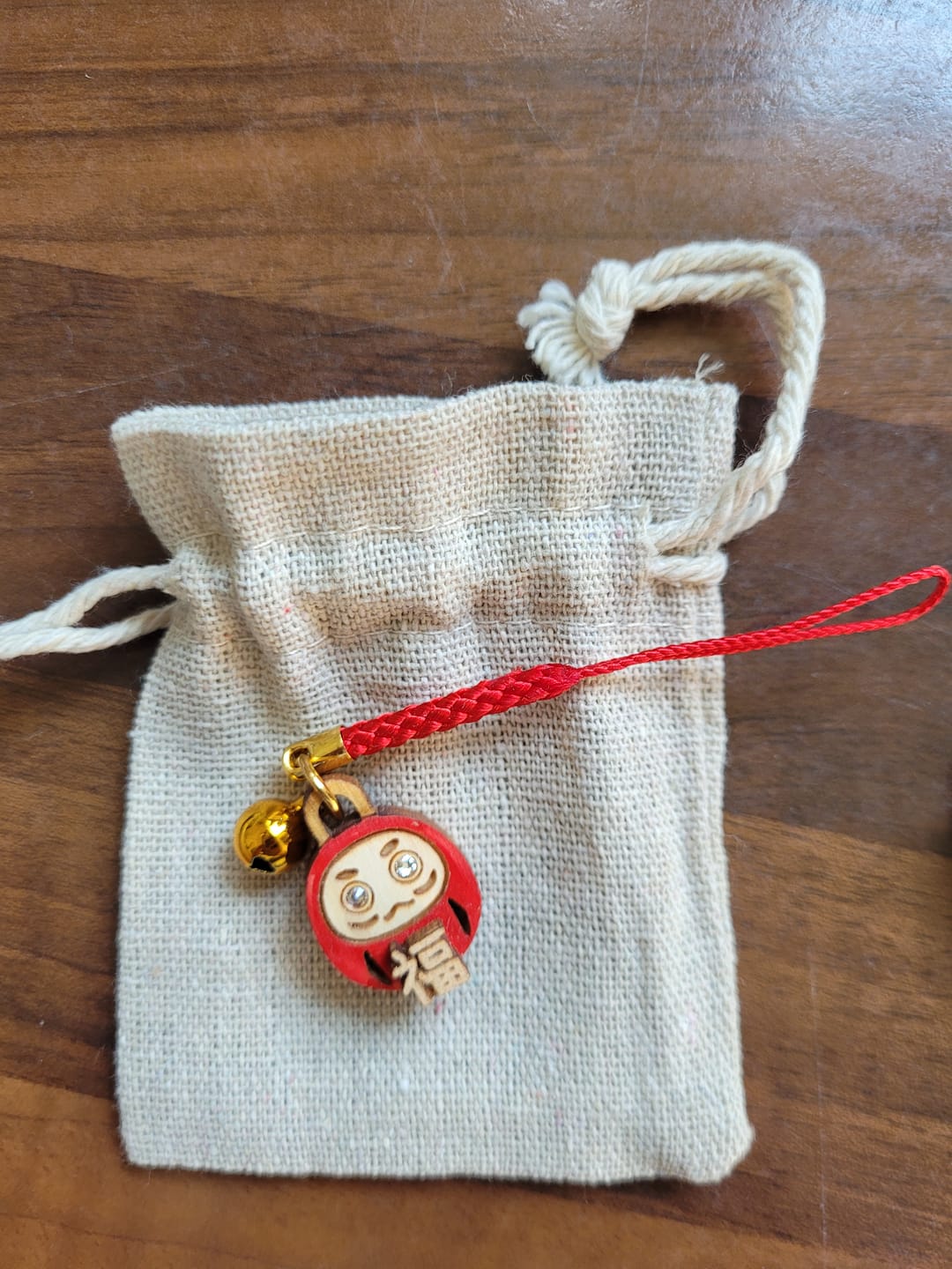 Customer photo review of Houten Sleutelhanger - Daruma