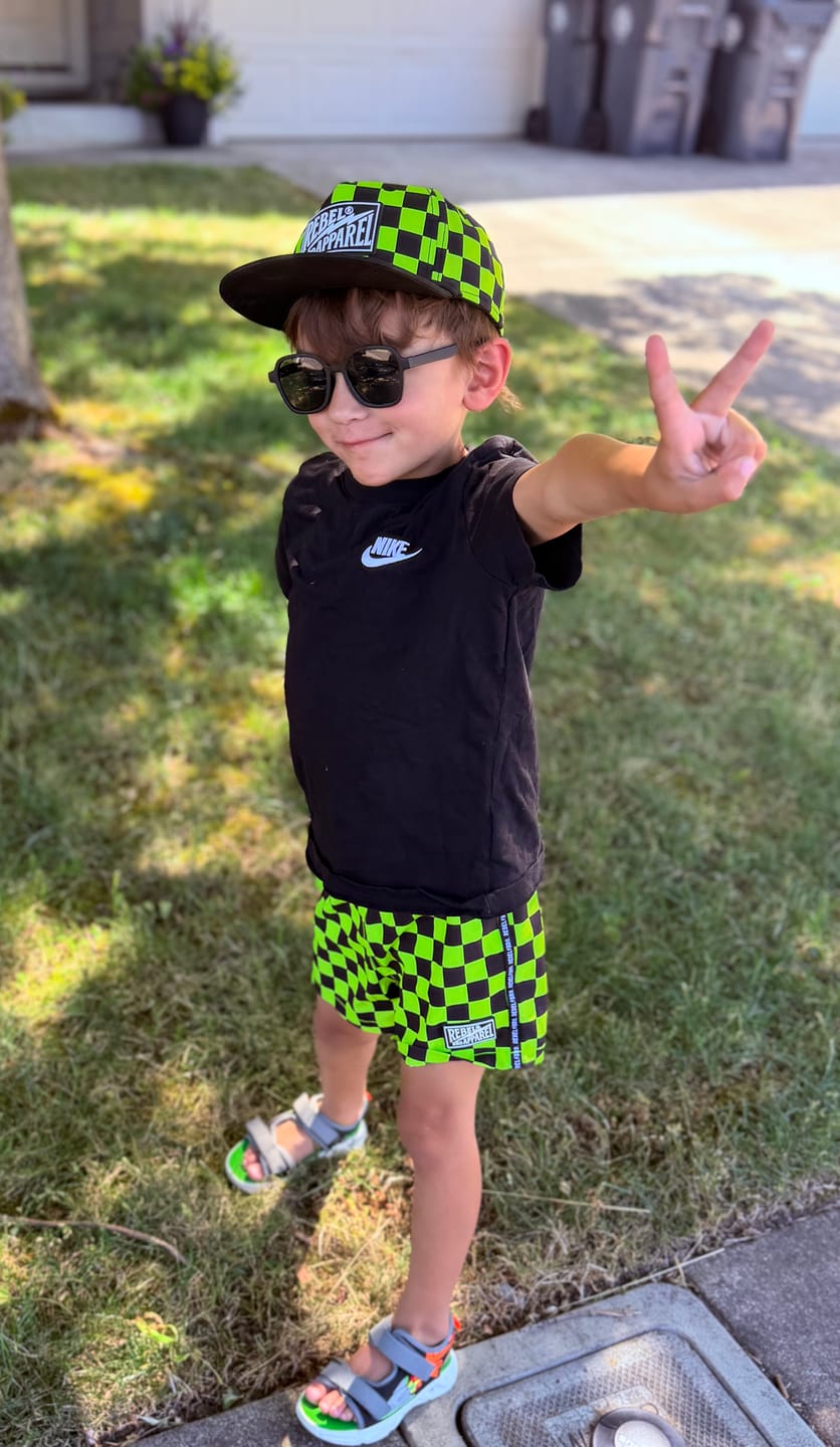 Customer photo review of Hybrid Swim Trunks in Neon Electric Lime + Black Checkered