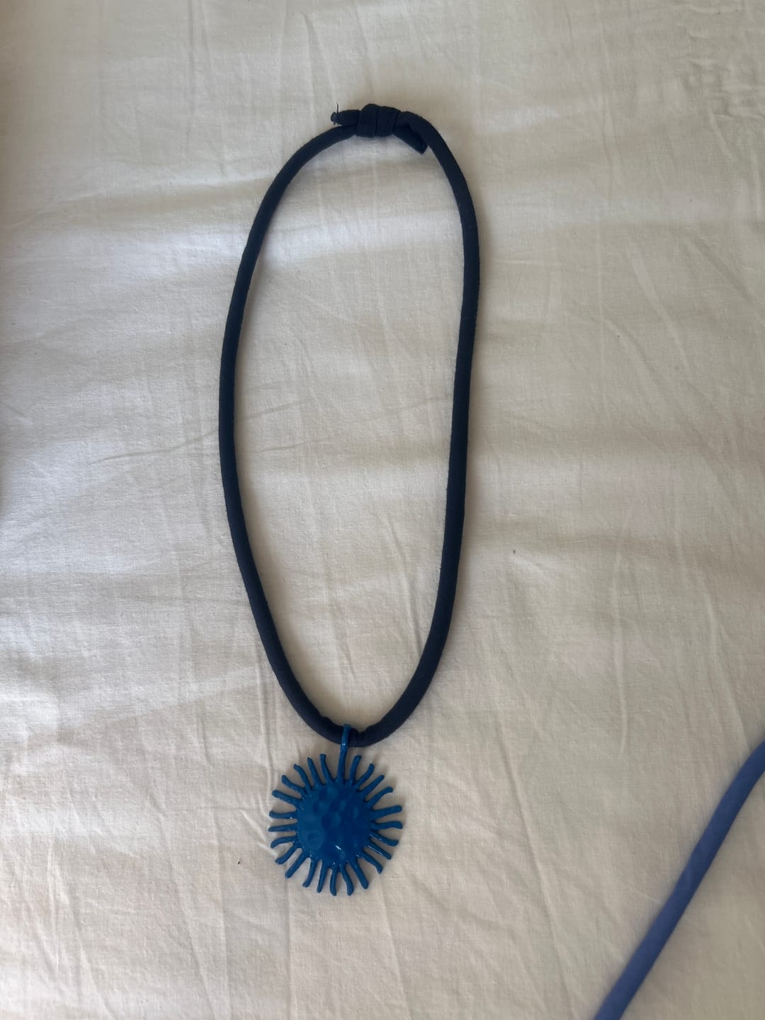 Customer photo review of CIONDOLO SOLE AZZURRO