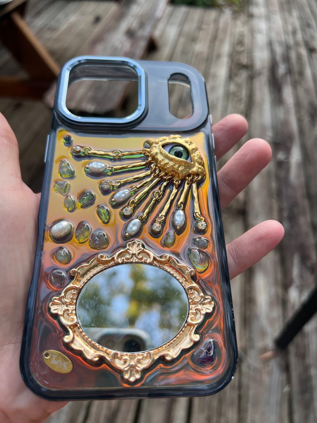 Customer photo review of Golden eye with mirror. Dark Chameleon Base