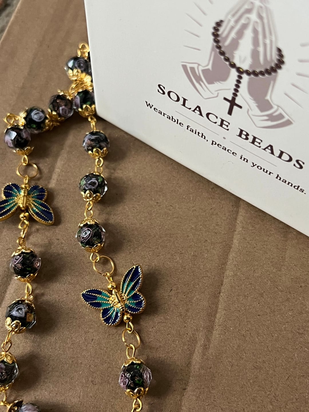Customer photo review of SolaceBeads Black Lampwork Floral Beads Rosary--The Radiant Grace Rosary: Hand-Blown Solace
