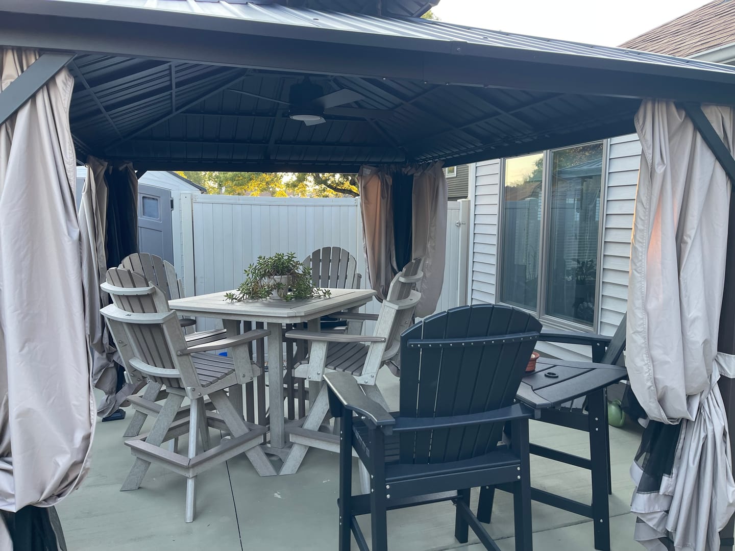Customer photo review of Shade N' Shelters 10' x 12' Duncan / McKinley Hardtop Gazebo Privacy Curtain with Hooks