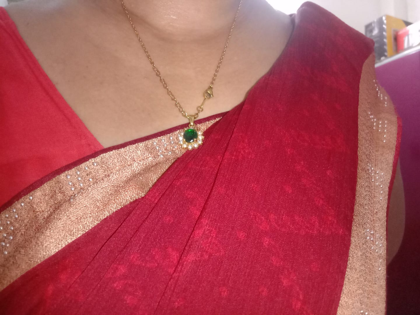 Customer photo review of Green Sapphire and Diamond Halo Pendant