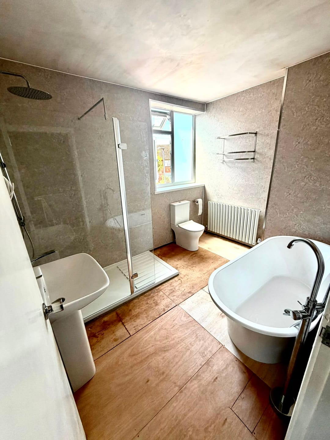 Customer photo review of Premium Beige Concrete Matt Shower Wall Panel - 1M x 2.4M