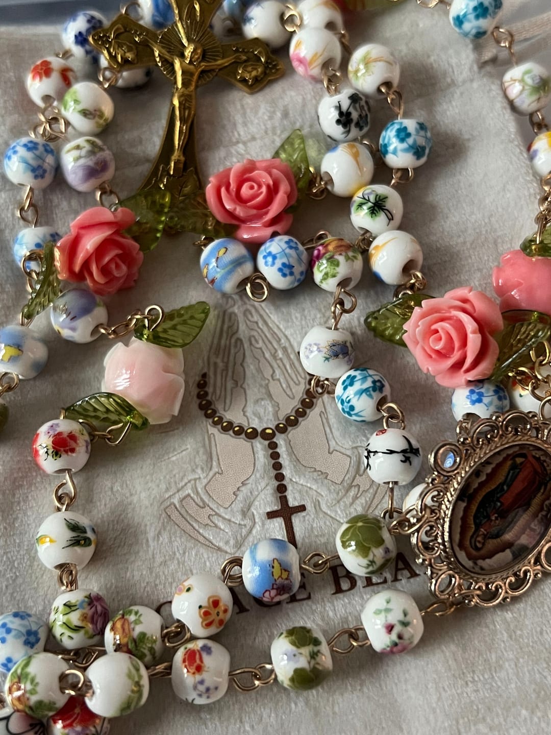 Customer photo review of SolaceBeads Vintage Mixed Floral Ceramic Rosary With Guadalupe & Crucifix: Timeless Garden