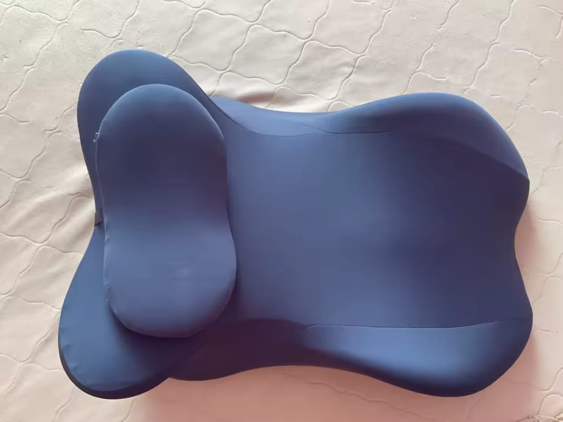 Customer photo review of The Pillow That Makes Her Grip The Sheets
