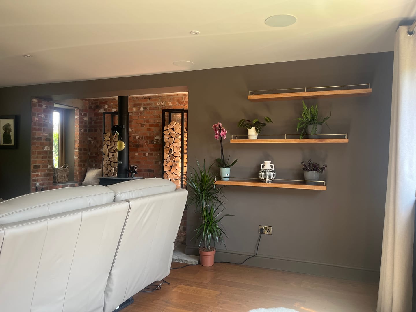 Customer photo review of Knurled Gallery Shelf Rail | Aged Brass