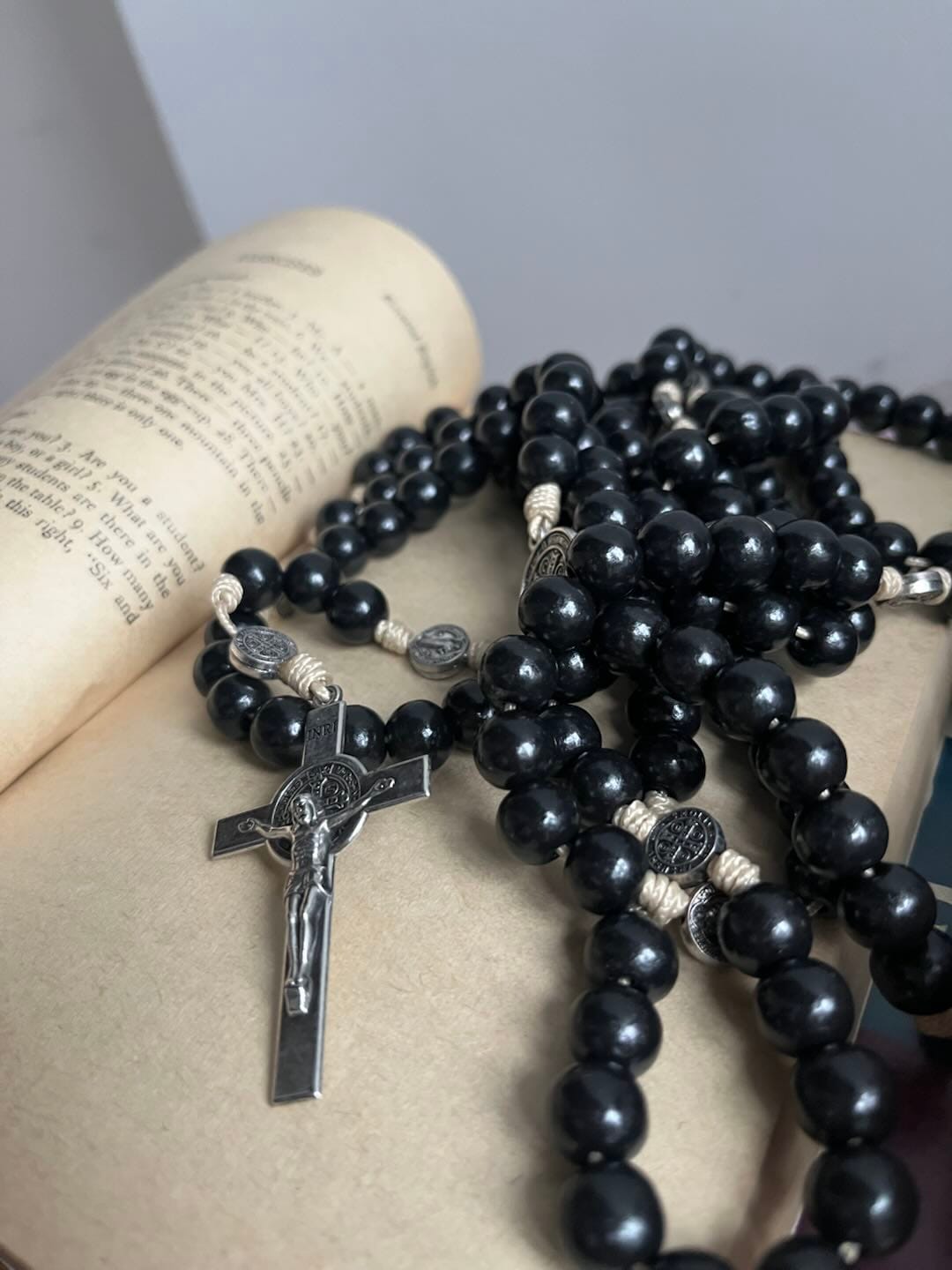 Customer photo review of SolaceBeads 15/20 Decade Ebony Wood Rosary With St. Benedict Medals & Crucifix: Protective Strength