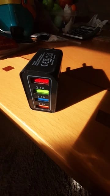 Customer photo review of ⚡ One Charger. Four Devices. Zero Waiting.⚡
