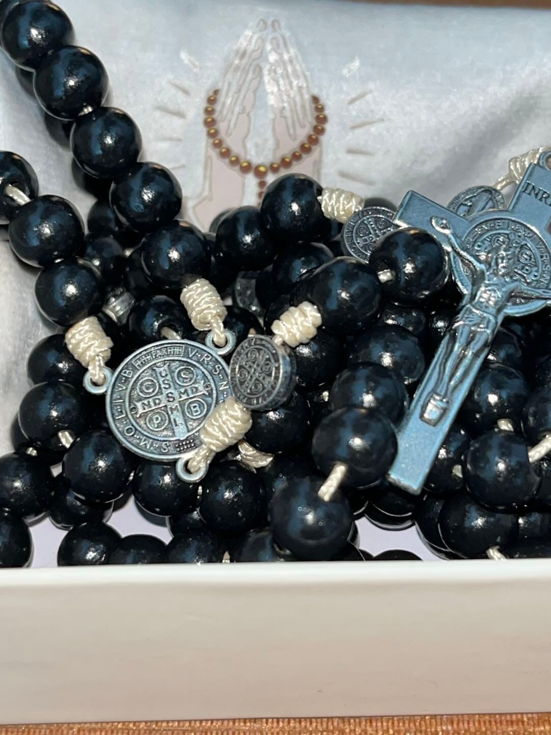 Customer photo review of SolaceBeads 15/20 Decade Ebony Wood Rosary With St. Benedict Medals & Crucifix: Protective Strength
