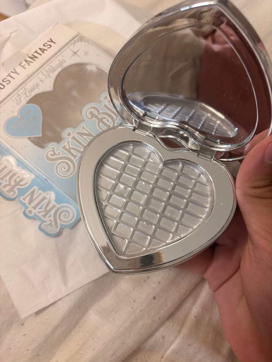 Customer photo review of Skin Bling Pressed Highlighter Powder