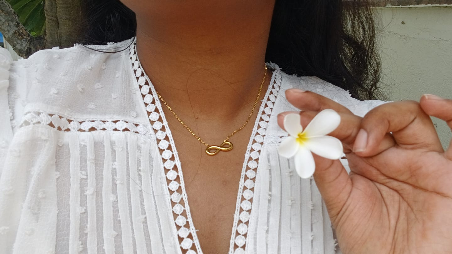 Customer photo review of Golden Infinity Necklace