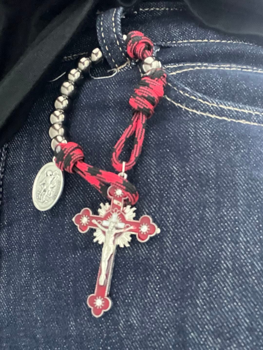 Customer photo review of Solacebeads Gunmetal Bead Car Rosary & Red Enamel Crucifix: Rooted In St. Michael Protection