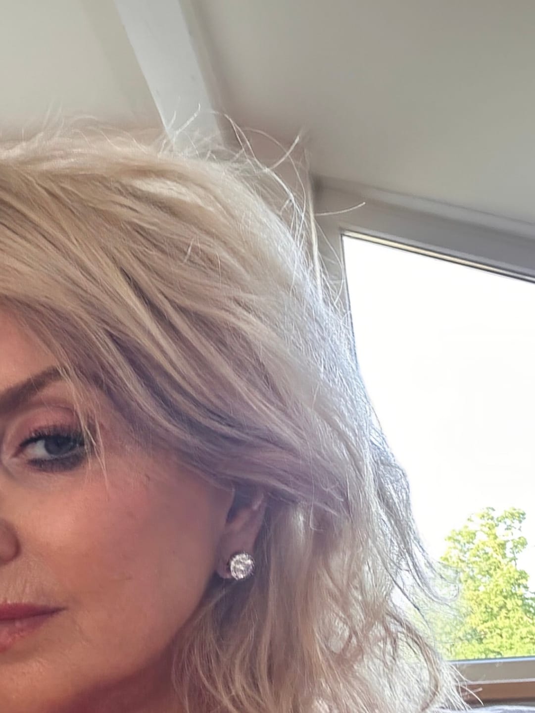 Customer photo review of Luce Halo Stud Earrings