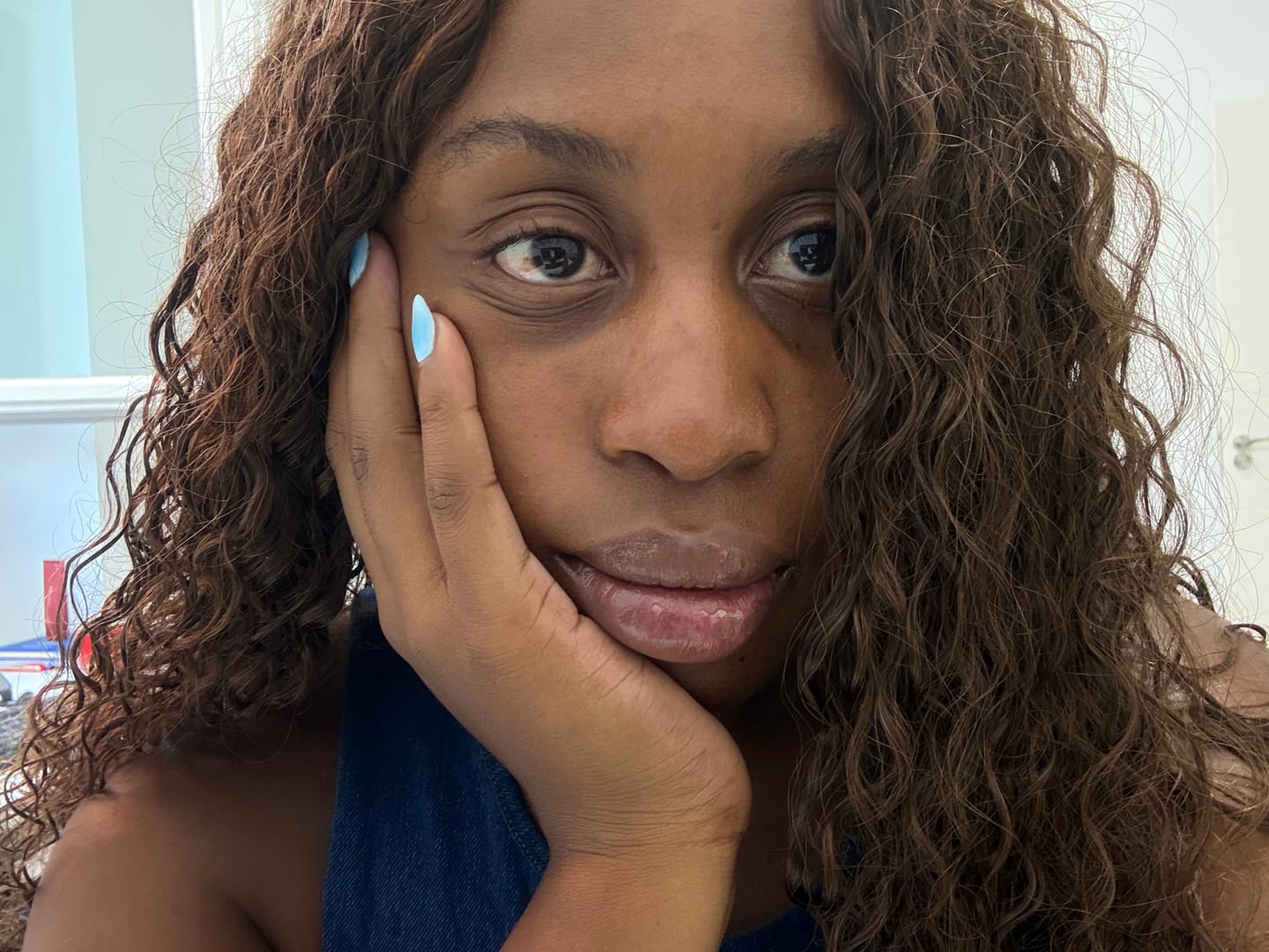 Customer photo review of Wavymy Chocolate Brown Burmese Curly Feather Crochet Human Hair Boho Braids Hair Extensions