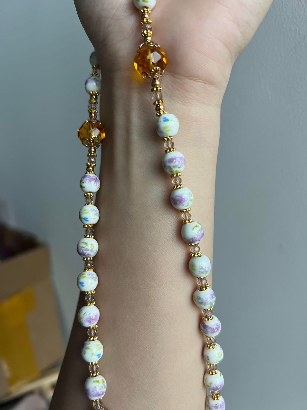 Customer photo review of SolaceBeads Lavender Floral With Golden Sacred Heart & Crucifix Rosary: Faith in Every Bead