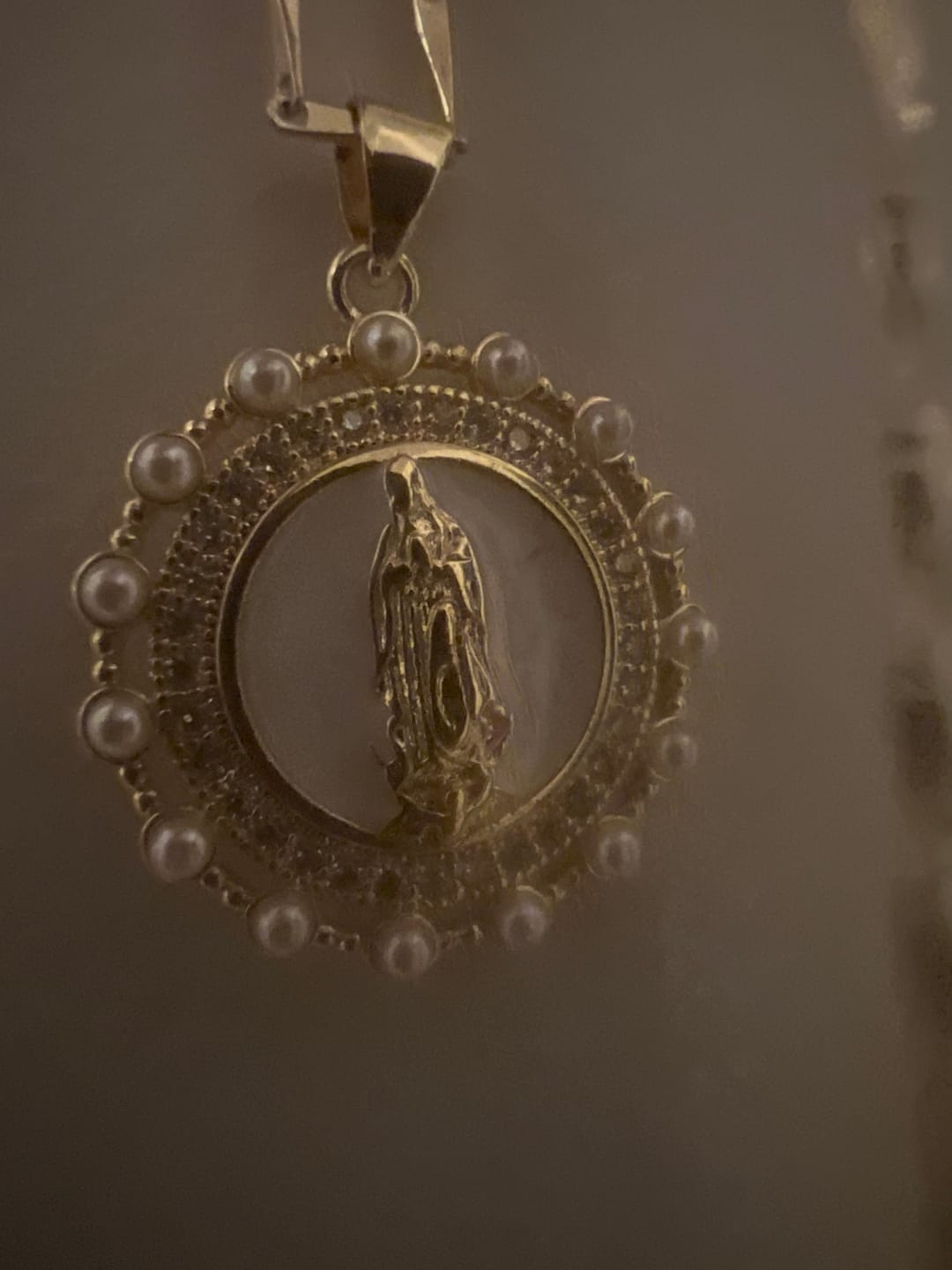 Customer photo review of Virgin Maria Multi-Charm Necklace - White