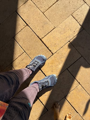Customer's Active II Pro shoes worn while standing on outdoor stone tile.