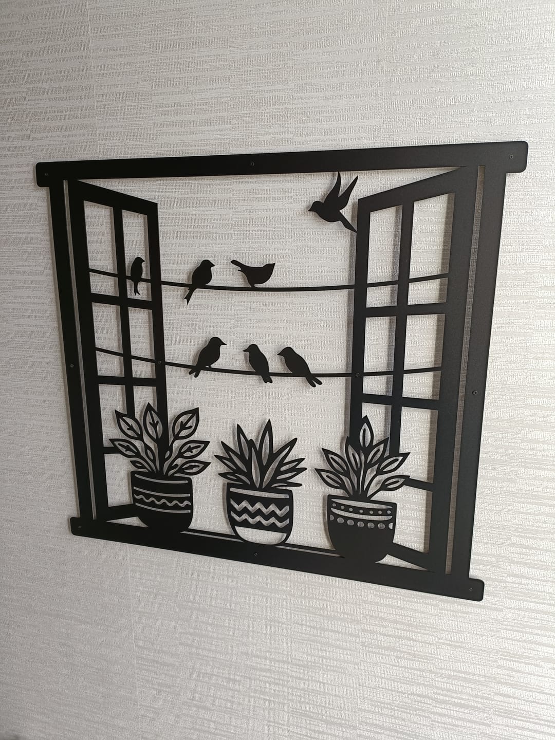 Customer photo review of Décoration murale en métal moderne - Oiseaux à la fenêtre