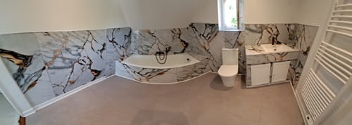 Customer photo review of Panneau Mural PVC Marbre Qatar – Veiné doré, Facile a Poser
